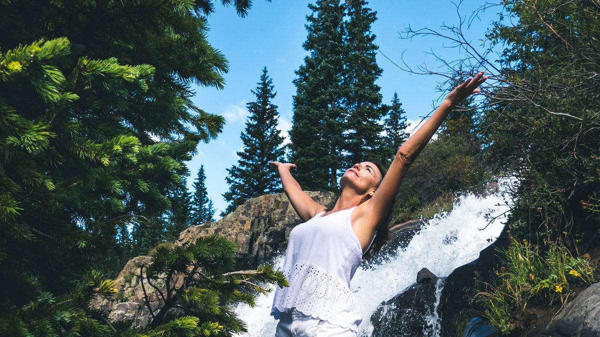 Beautiful Women by Water Fall