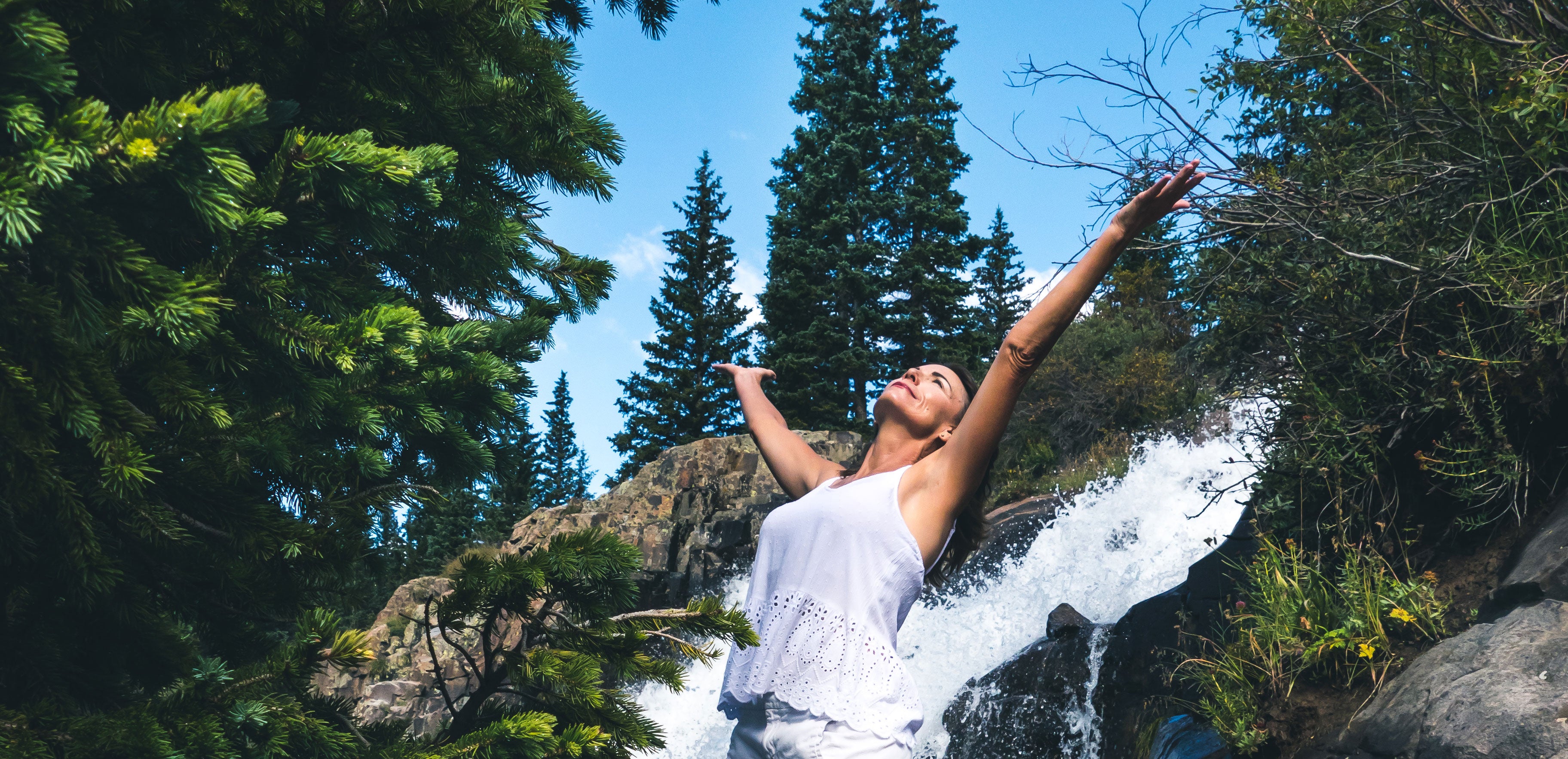 Beautiful Women by Water Fall