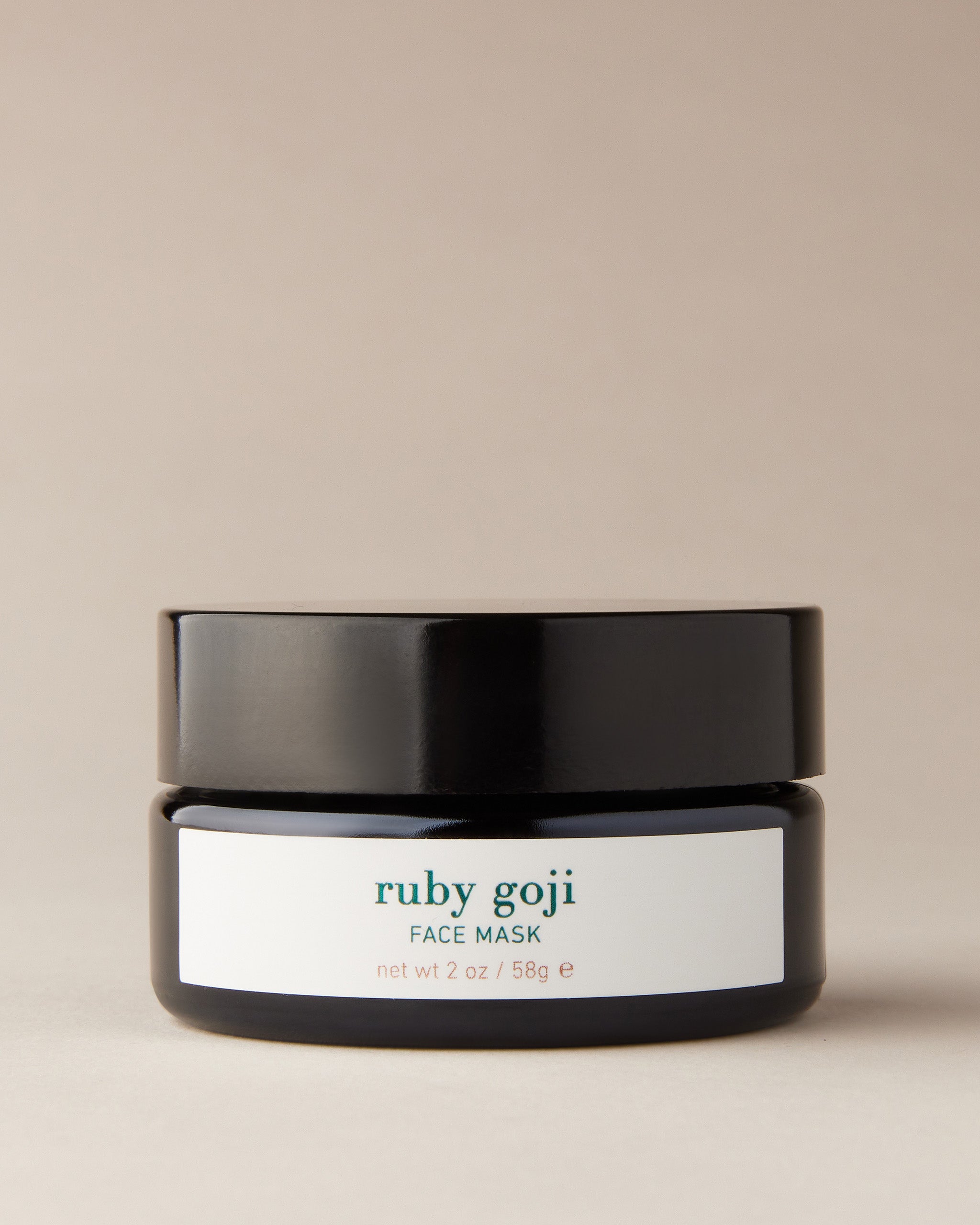ISUN Ruby Goji Face Mask on a beige background