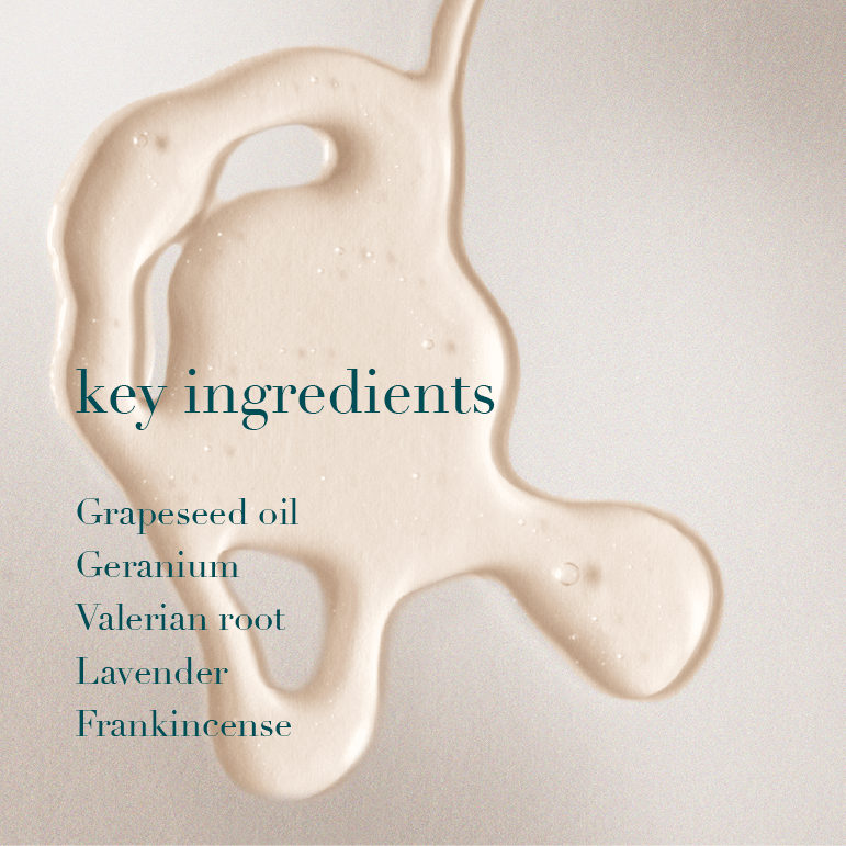 Beige liquid with text listing key ingredients on a light background