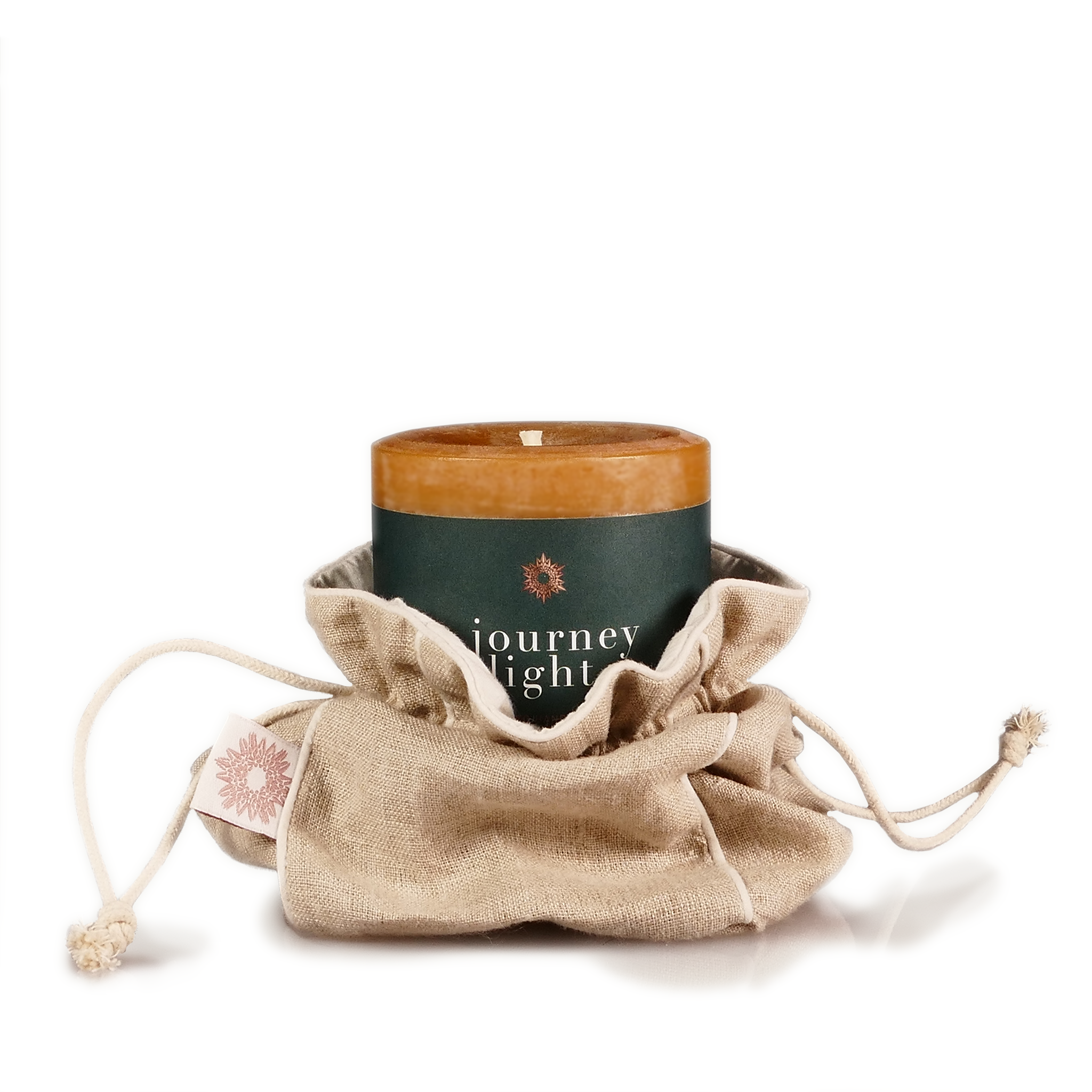 ISUN Journey of Light Candle in a beige pouch