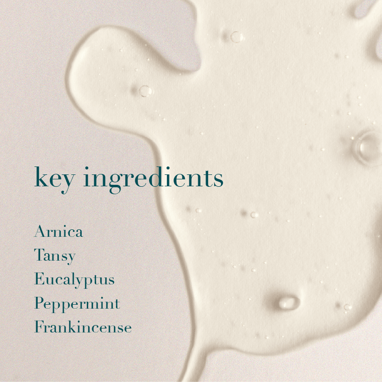 White liquid with text listing key ingredients on a light background