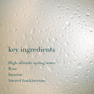 Text overlay on a textured background with water droplets