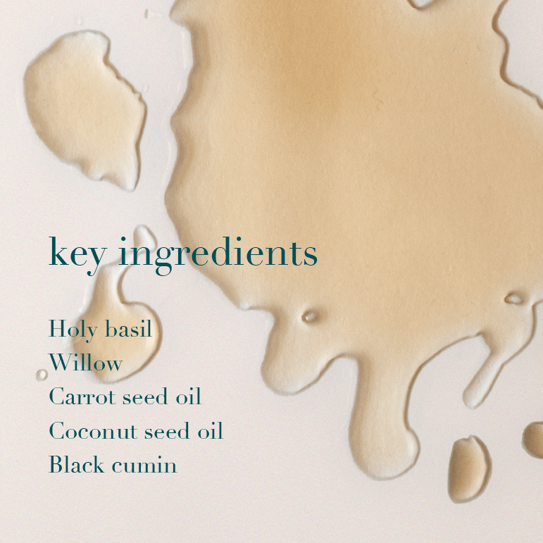 Key ingredients listed with liquid droplets on a light background