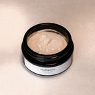Birdseye view of a jar filled with cream
